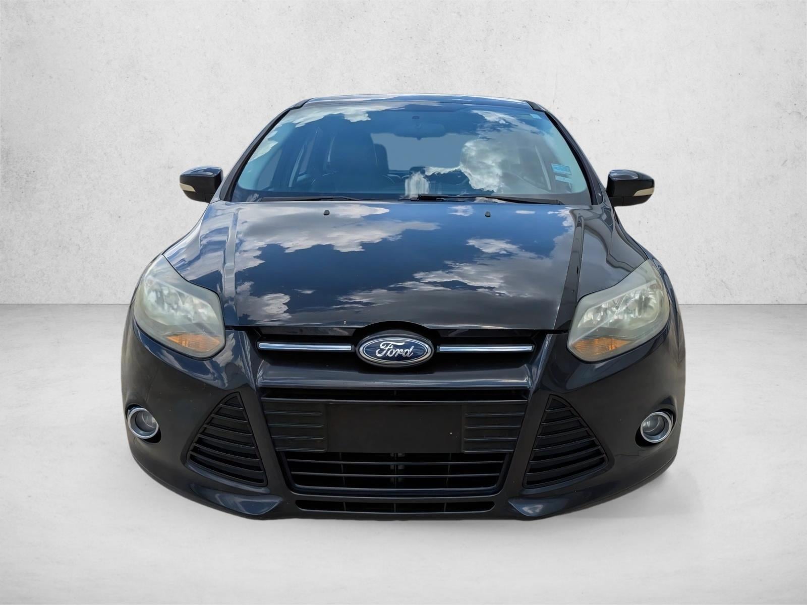 Used 2014 Ford Focus Titanium with VIN 1FADP3N24EL458175 for sale in Winter Park, FL