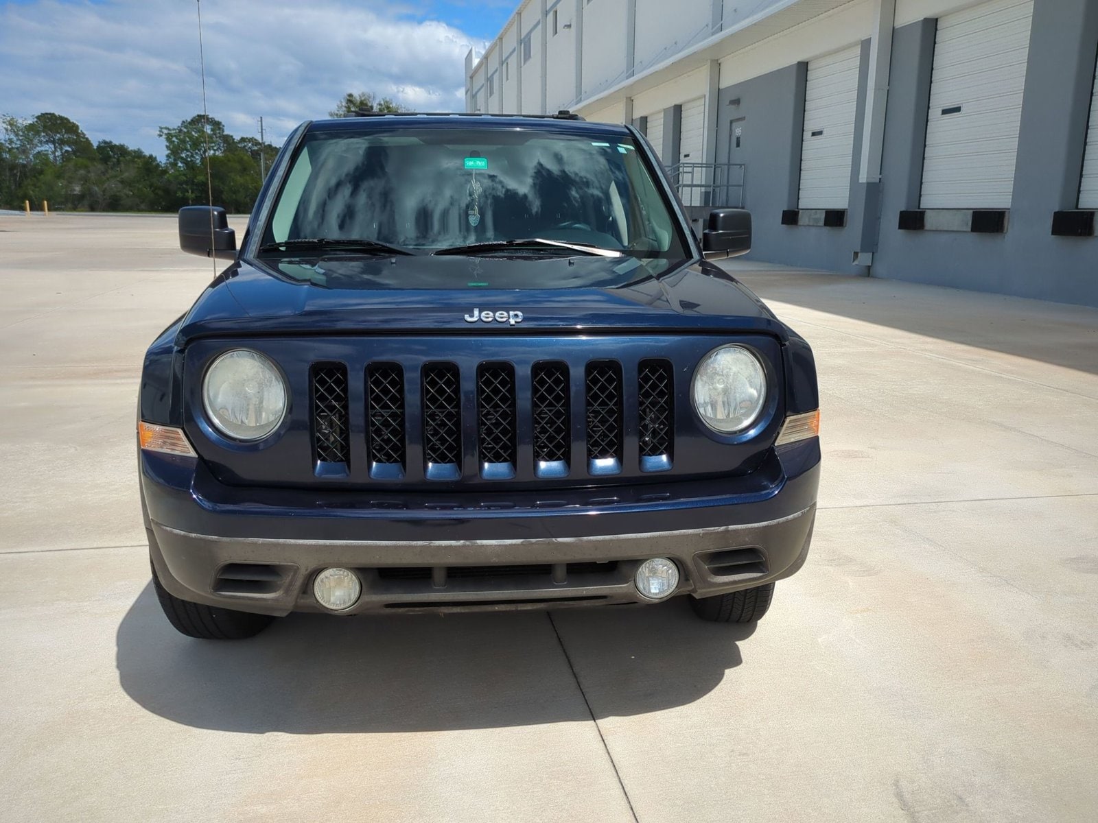 Used 2014 Jeep Patriot Latitude with VIN 1C4NJPFB7ED764321 for sale in Winter Park, FL