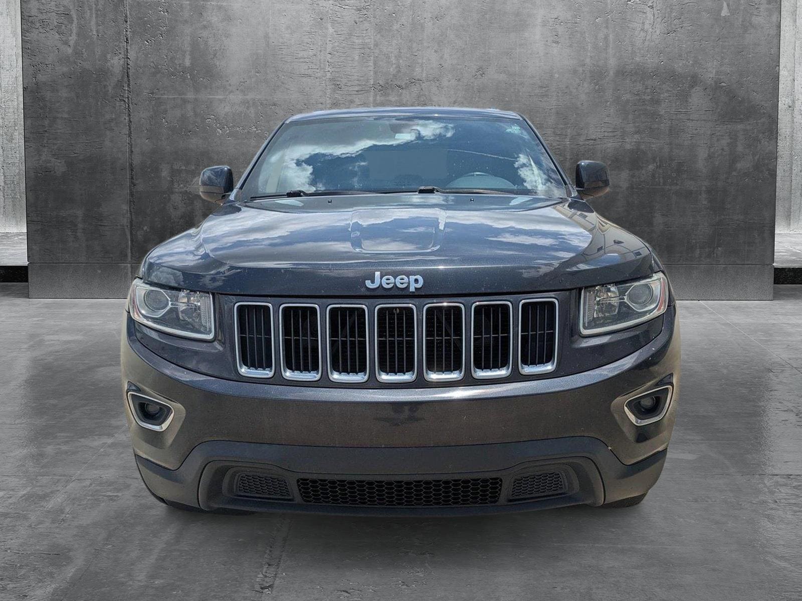 Used 2014 Jeep Grand Cherokee Laredo with VIN 1C4RJEAG6EC145482 for sale in Winter Park, FL