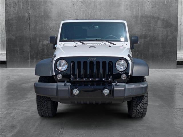 Used 2017 Jeep Wrangler Willys Wheeler with VIN 1C4AJWAG6HL599402 for sale in Tustin, CA