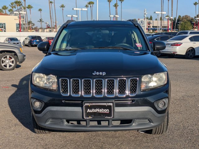 Used 2014 Jeep Compass Sport with VIN 1C4NJCBA4ED777016 for sale in Tustin, CA
