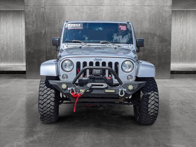 Used 2014 Jeep Wrangler Unlimited Sahara with VIN 1C4BJWEG1EL300120 for sale in Bellevue, WA