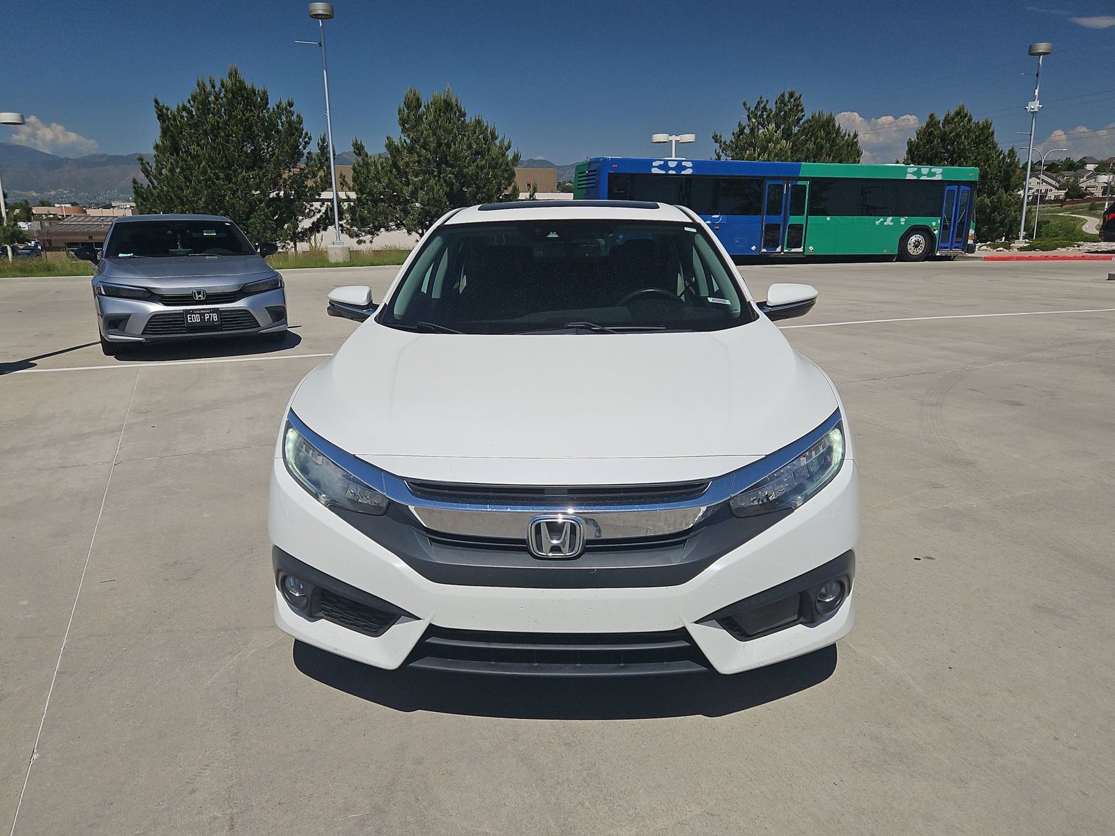 Used 2018 Honda Civic Touring with VIN 19XFC1F98JE000222 for sale in Colorado Springs, CO