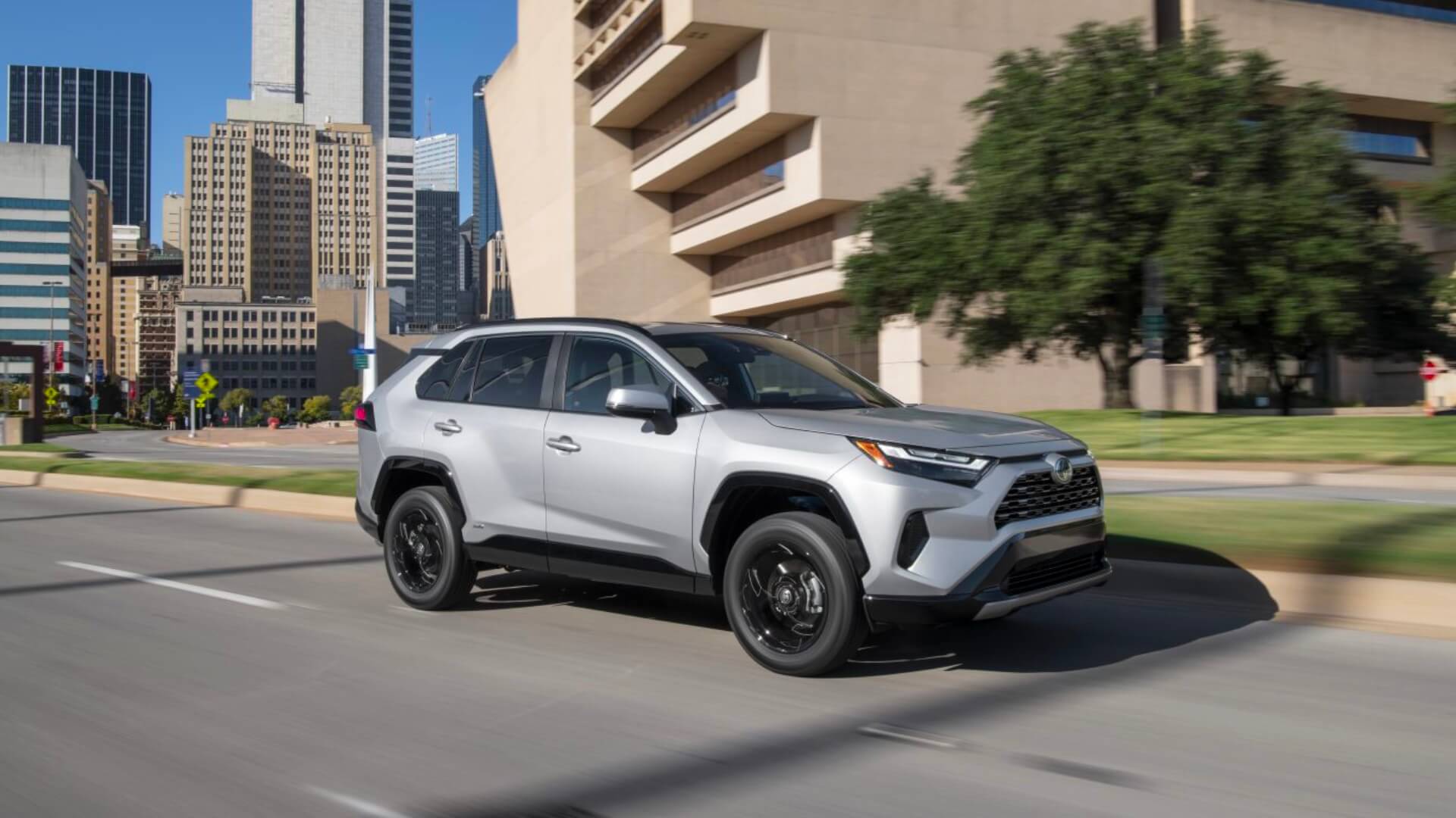 Visit an AutoNation USA Location near you to check out our used Toyota RAV4 Hybrid Toyota RAV4 Hybrid driving through a city