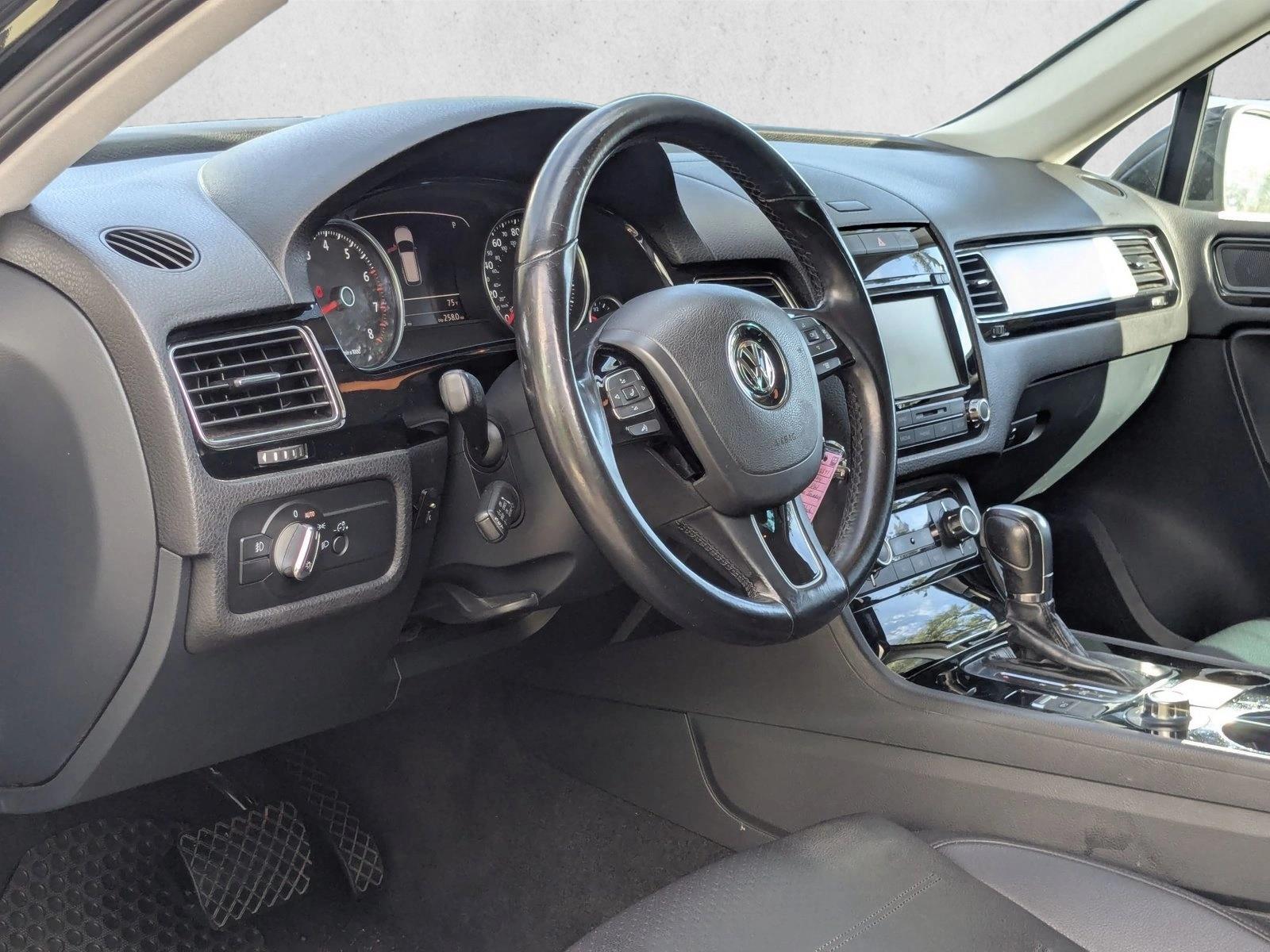 Used 2014 Volkswagen Touareg Sport with VIN WVGEF9BP2ED006591 for sale in Sanford, FL