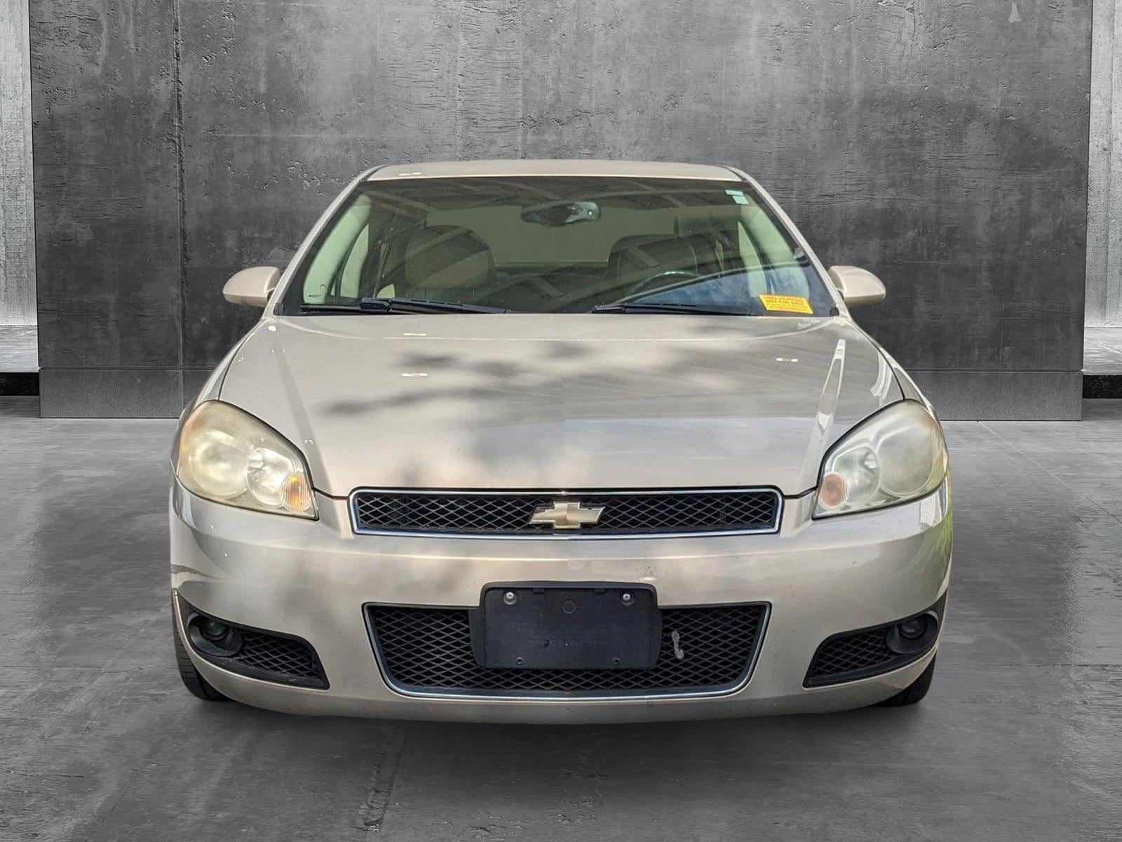 Used 2012 Chevrolet Impala LTZ with VIN 2G1WC5E3XC1174564 for sale in Sanford, FL