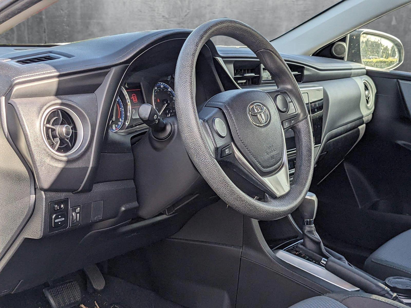 Used 2017 Toyota Corolla LE with VIN 5YFBURHEXHP672988 for sale in Sanford, FL