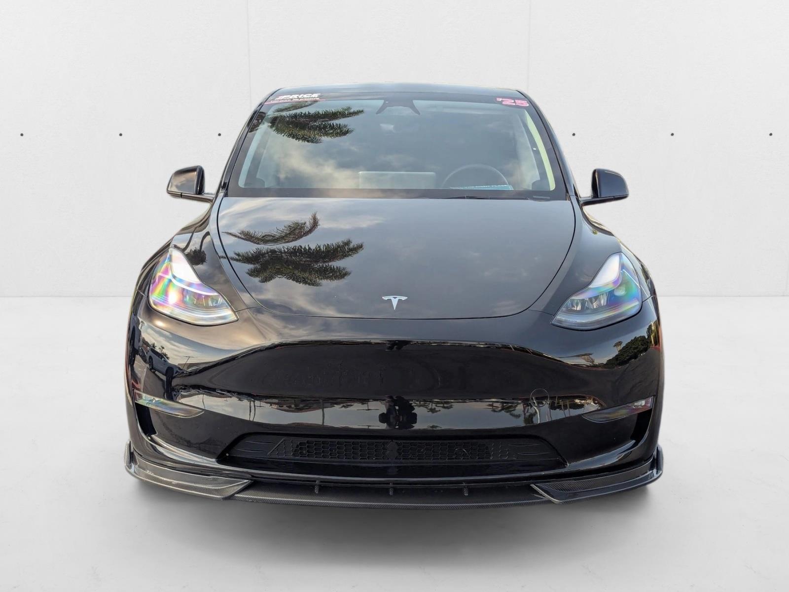 Used 2025 Tesla Model Y Long Range with VIN 7SAYGAEE8SF290312 for sale in Kansas City