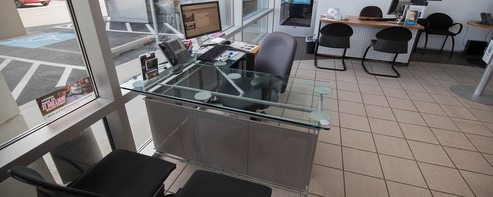 Desks and chairs inside of AutoNation Volkswagen Spokane finance center.