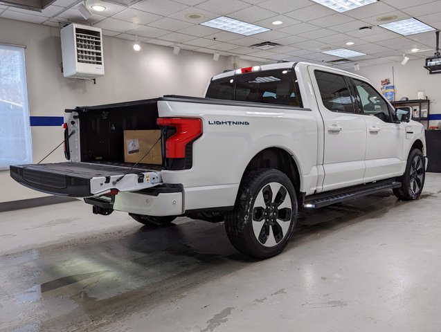 Used 2022 Ford F-150 Lightning Platinum with VIN 1FT6W1EV1NWG08245 for sale in White Bear Lake, Minnesota