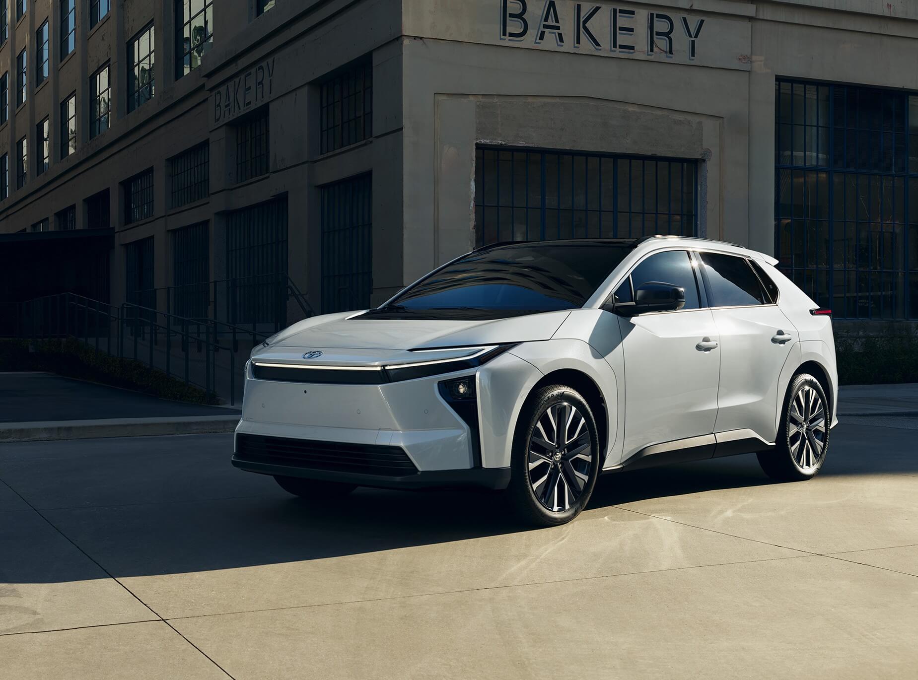 Toyota bZ parked outside a building
