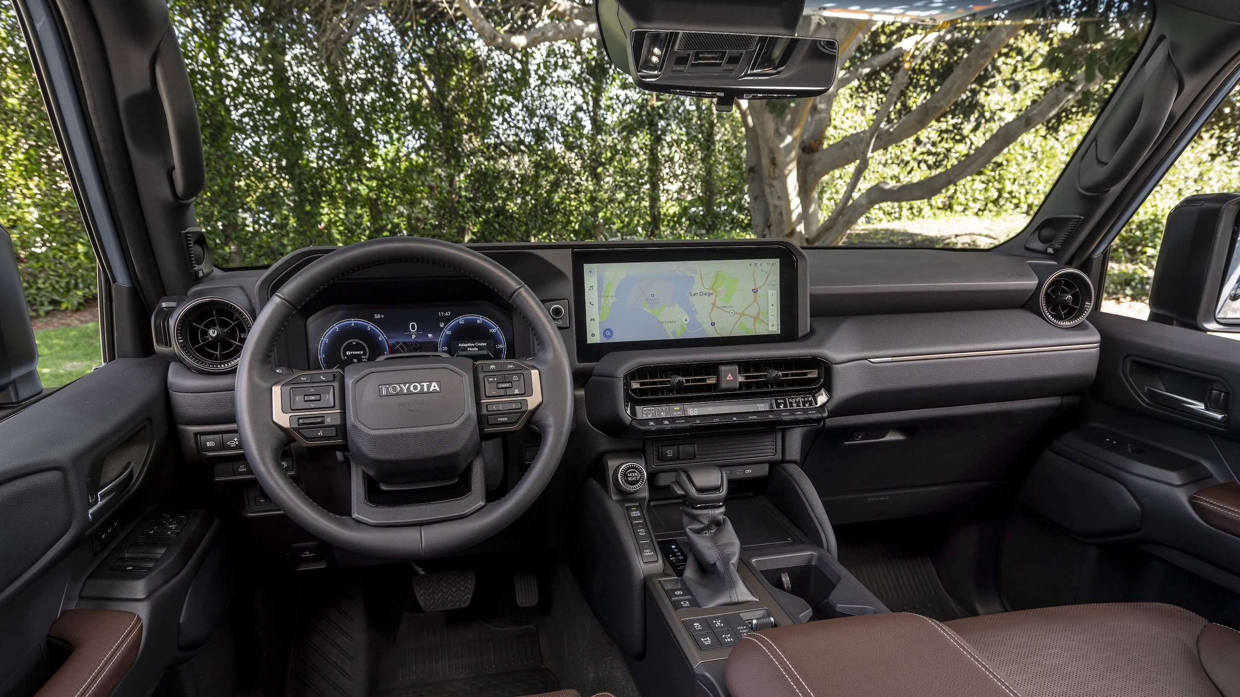 2026_Toyota_LandCruiser_Java_002.jpg The steering wheel, center consol, and digital display of the Land Cruiser