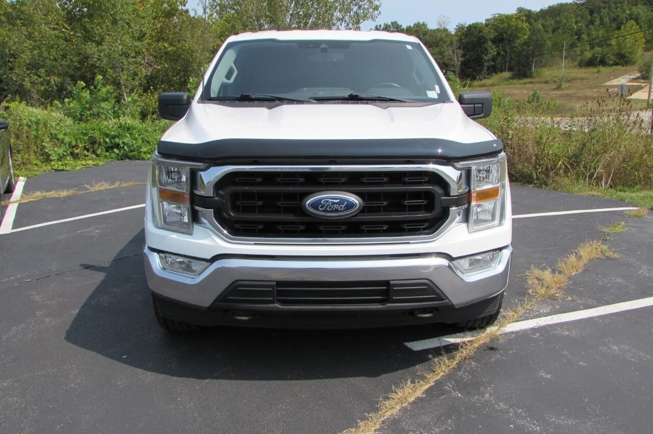 Used 2022 Ford F-150 XLT with VIN 1FTFW1E58NKE36884 for sale in De Soto, MO