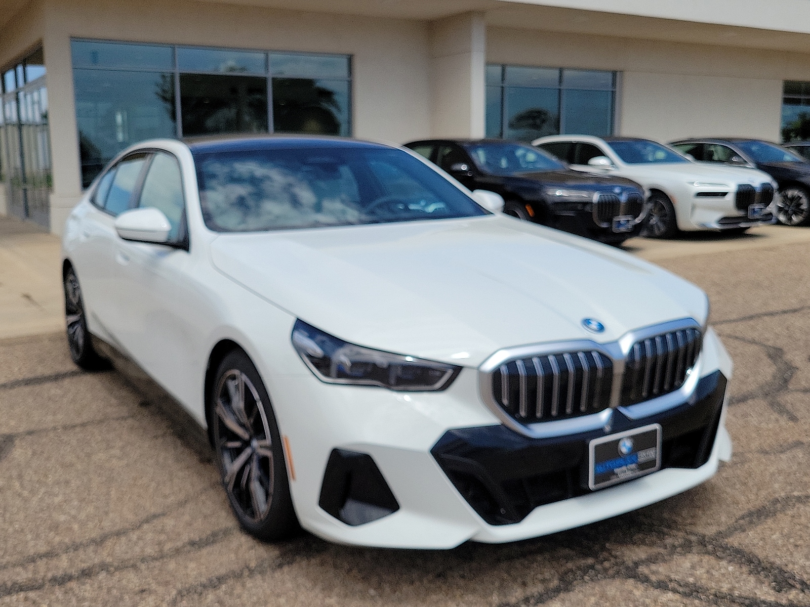 2026 BMW 5 Series 550e - Photo 6