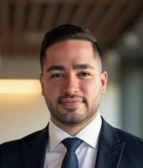 Staff member Carlos Mora from ID_3b8e645df088