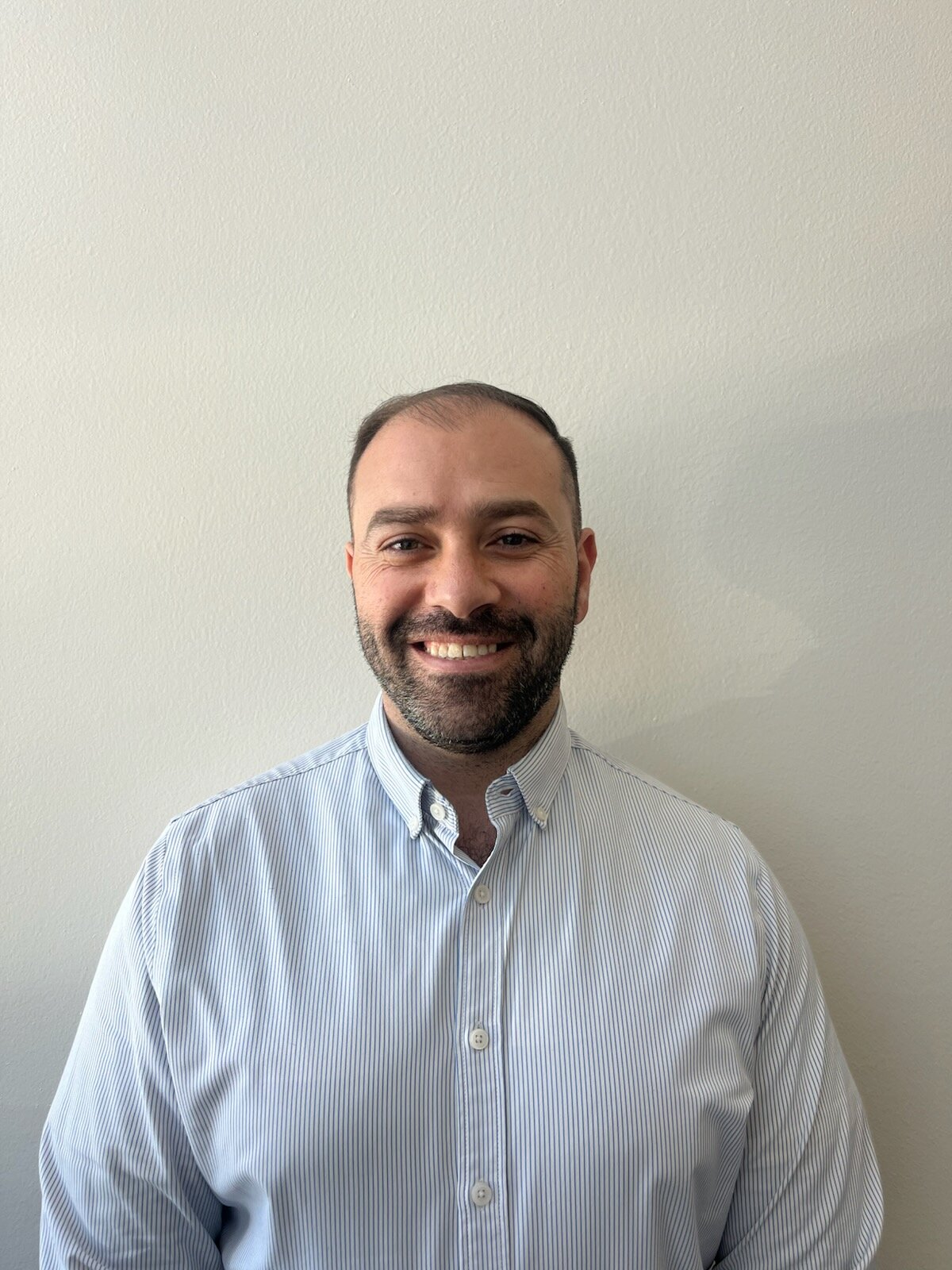 Staff member Fadi Al Kharouf from ID_e9eac6baa7e3