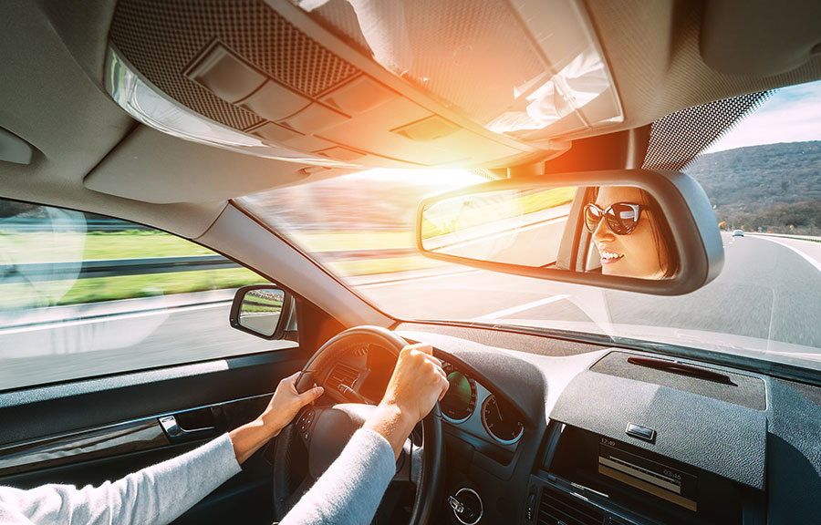 Why and How to Buy a Rental Car A Woman Driving a Car