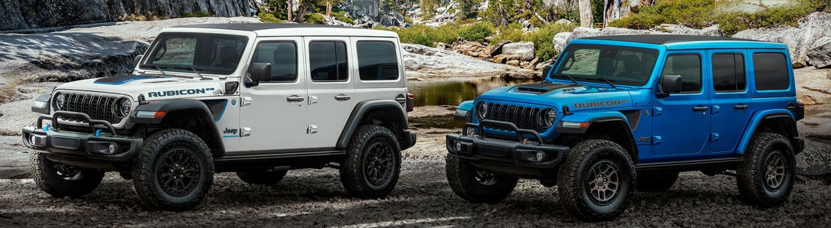 Jeep Wrangler SUVs Parked in the Woods