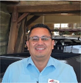 Staff member Carlos Cordova from ID_606268