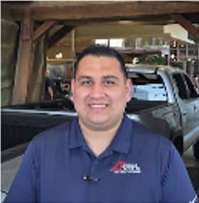 Staff member Eric Tafoya from ID_606268