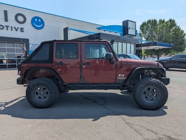 Used 2009 Jeep Wrangler Unlimited X with VIN 1J4GA39139L786763 for sale in Sandy, UT