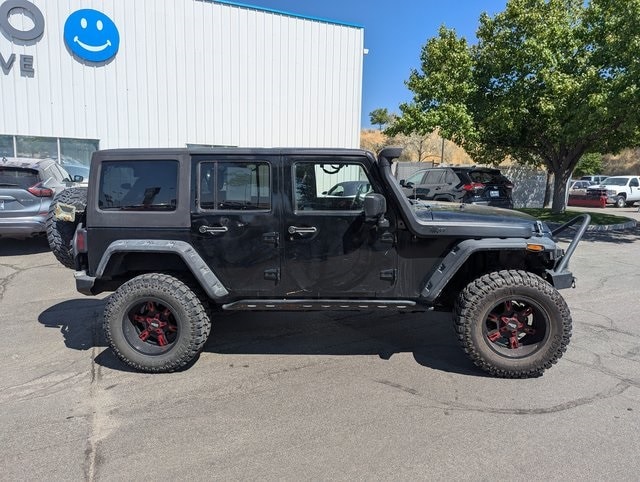 Used 2014 Jeep Wrangler Unlimited Sahara with VIN 1C4BJWEG3EL132190 for sale in Sandy, UT