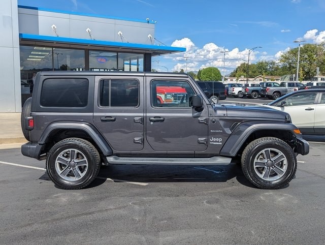 Used 2019 Jeep Wrangler Unlimited Sahara with VIN 1C4HJXEG5KW517566 for sale in Sandy, UT