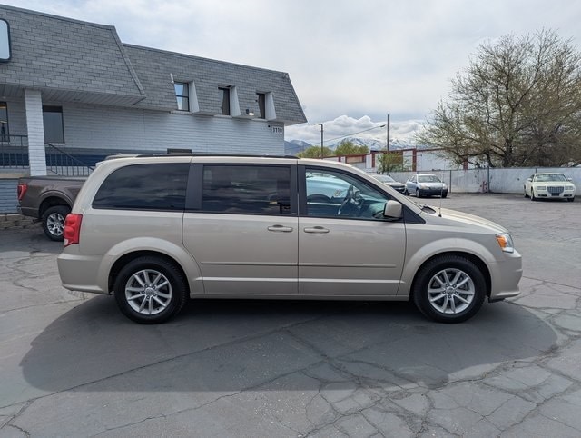 Used 2014 Dodge Grand Caravan SXT with VIN 2C4RDGCG7ER253911 for sale in Sandy, UT