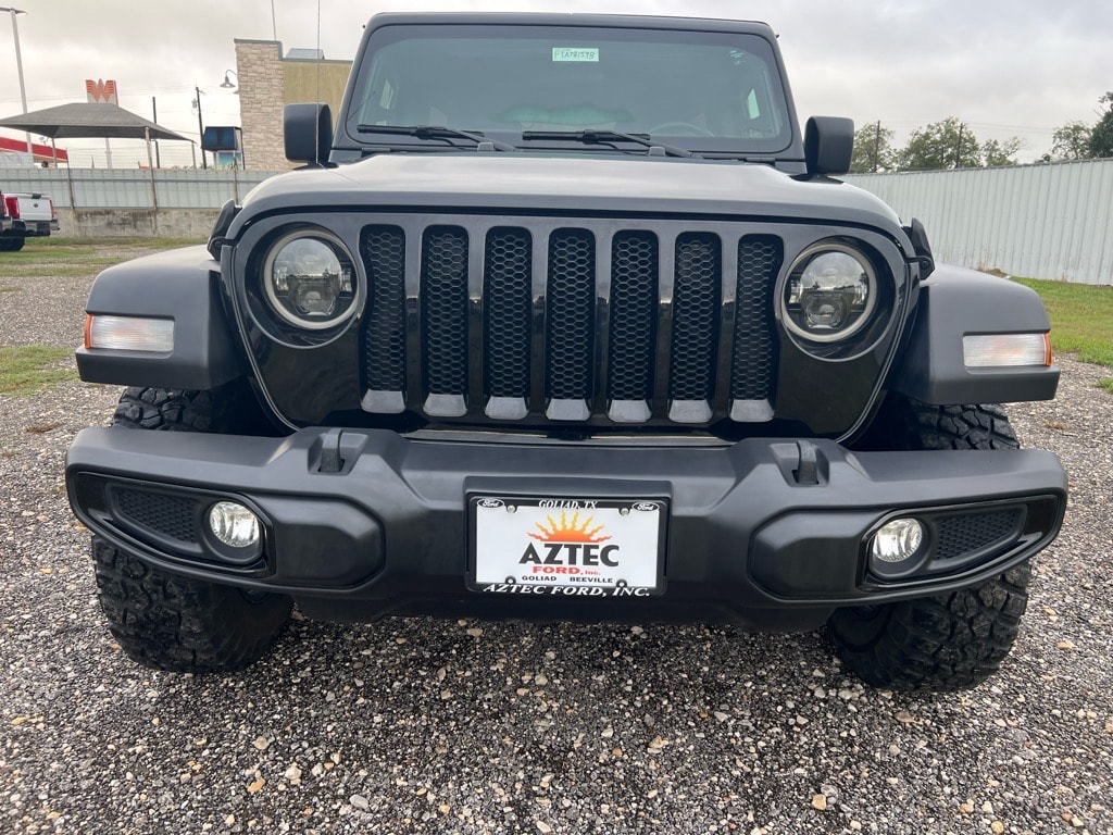 Used 2021 Jeep Wrangler Unlimited Willys Sport with VIN 1C4HJXDN7MW821453 for sale in Goliad, TX