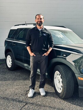 Staff member Derek Dunphy from ID_4b3da54321bc