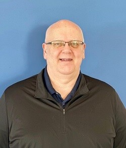 Staff member Chuck Massart from ID_940a8392de48