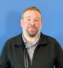 Staff member Aaron Catania from ID_940a8392de48