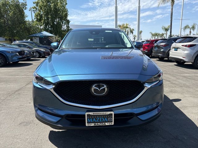 Used 2021 Mazda CX-5 Grand Touring with VIN JM3KFADM5M0411272 for sale in Bakersfield, CA