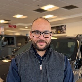 Staff member Mohamed Hassan from 6b10d68a4ac0