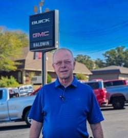 Staff member Tom Green from fd947a14a2a0