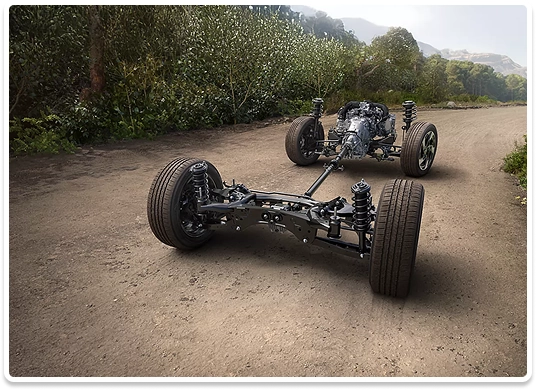 A cutaway view of the Subaru Symmetrical All-Wheel Drive powertrain and suspension on a dirt road