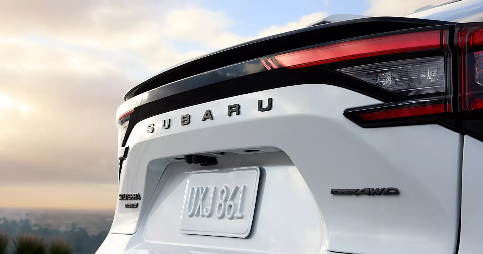 Close-up of the SUBARU badge and tail light on the Solterra rear gate