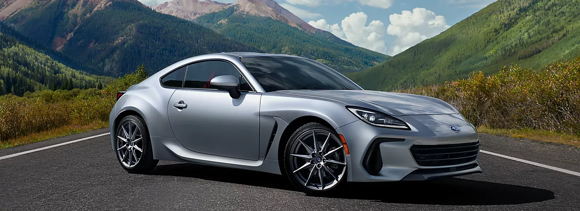 A silver 2026 Subaru BRZ on a mountain road