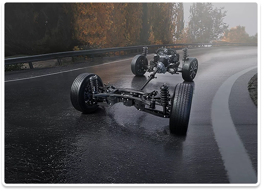 A cutaway view of the Subaru Symmetrical All-Wheel Drive powertrain and suspension on a wet road