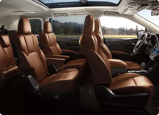 Brown leather-trimmed captain’s chairs in the seven-passenger Ascent cabin