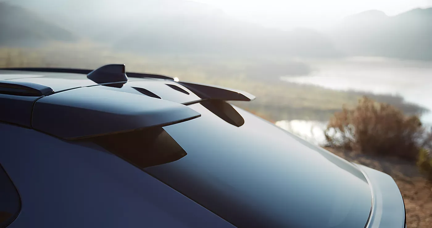 Detail of the extended rear ducktail spoiler on the 2026 Subaru Solterra
