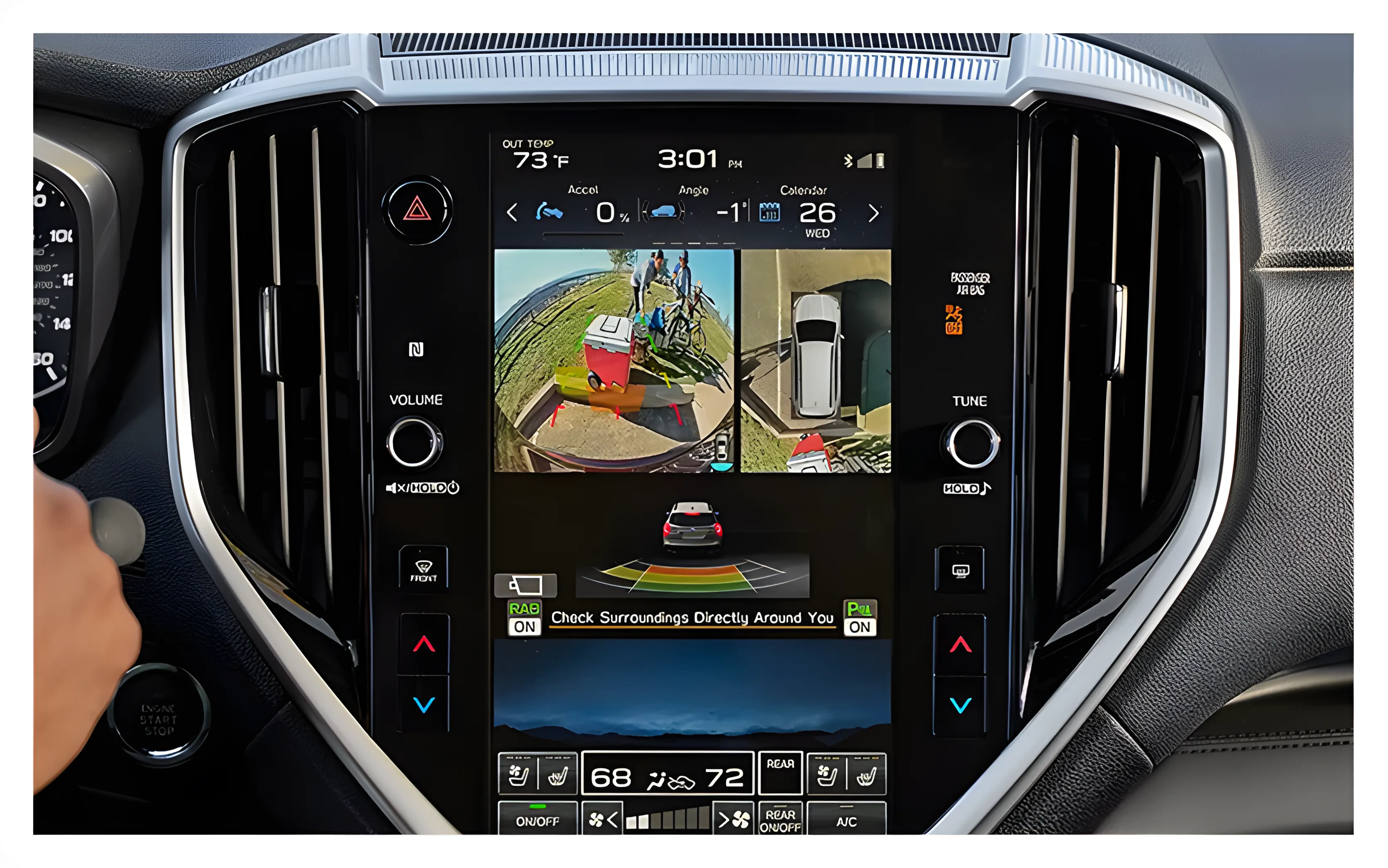 Driver using the Ascent touchscreen showing the 360-degree Surround View Monitor