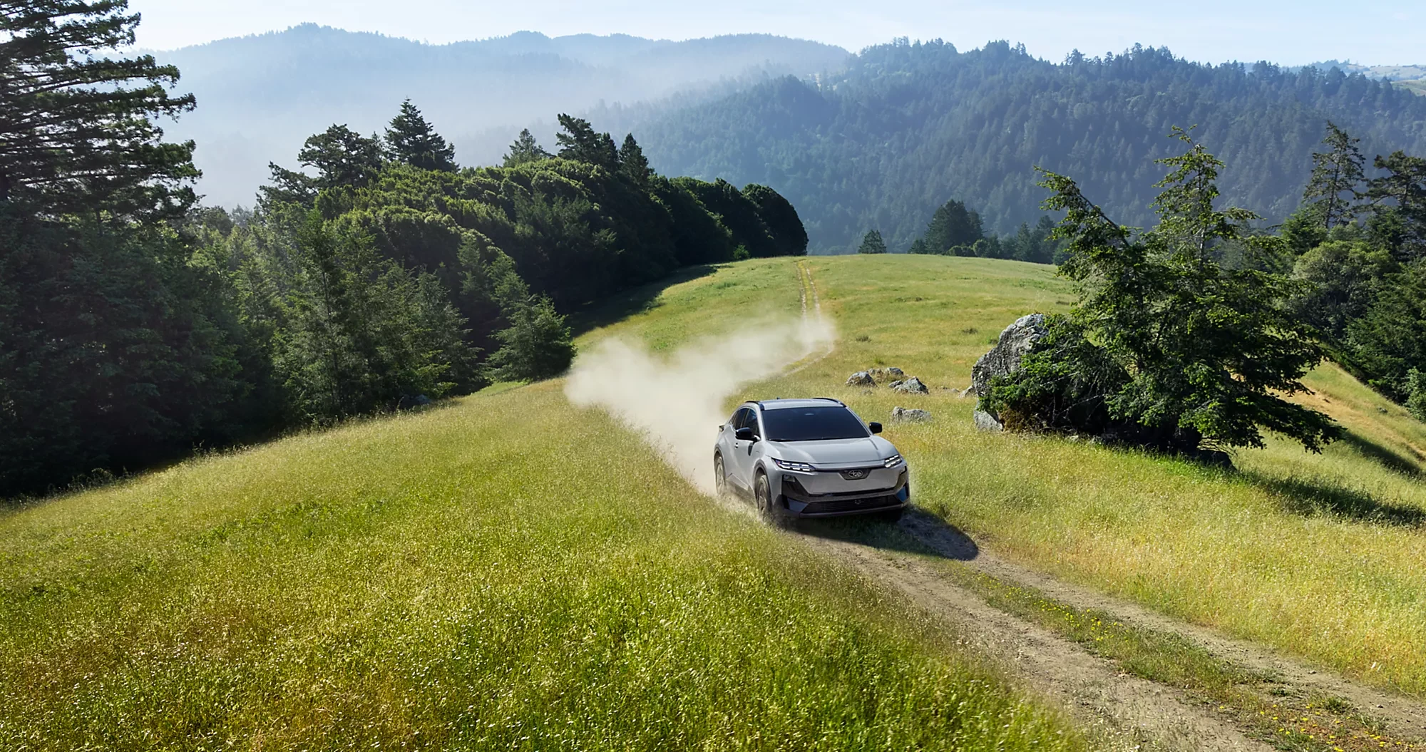 A 2026 Subaru Uncharted on a long open highway