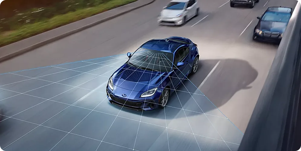 A Subaru BRZ on a highway with EyeSight lane-detection graphics overlaid