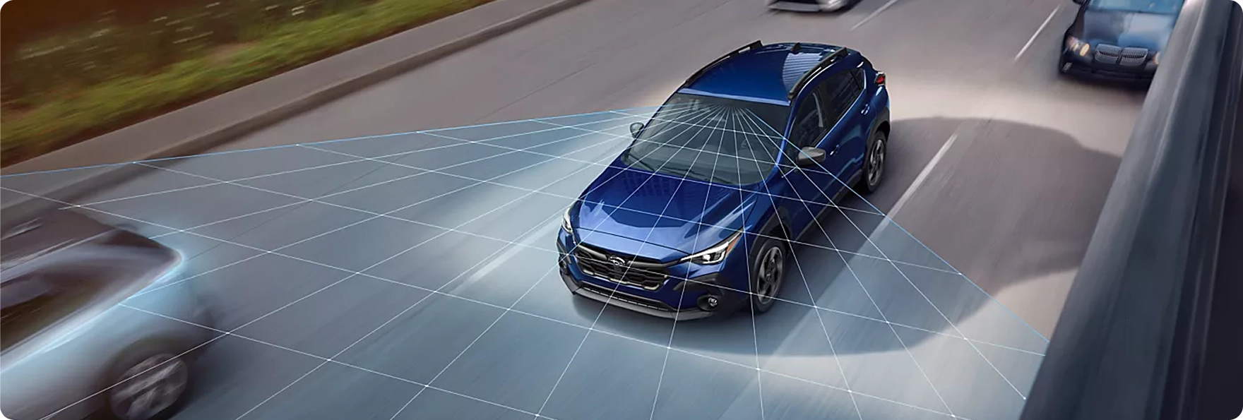 An overhead view of a blue Subaru Crosstrek in traffic with the EyeSight detection field mapped out around it