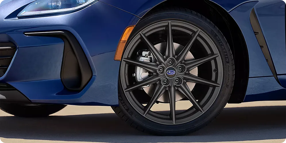 Close-up of an 18-inch alloy wheel on a blue Subaru BRZ