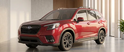 Red Subaru electric SUV in a showroom