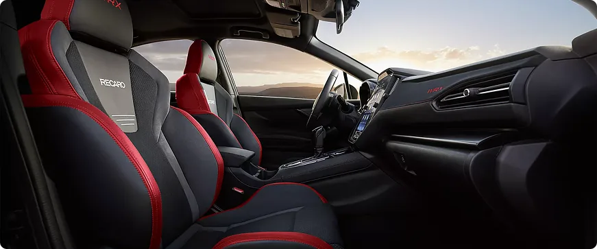 Red and black WRX front seats viewed from the rear