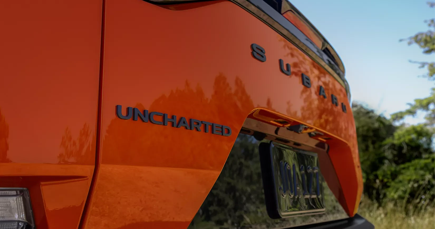 Close-up of a 20-inch bladed alloy wheel on the Uncharted