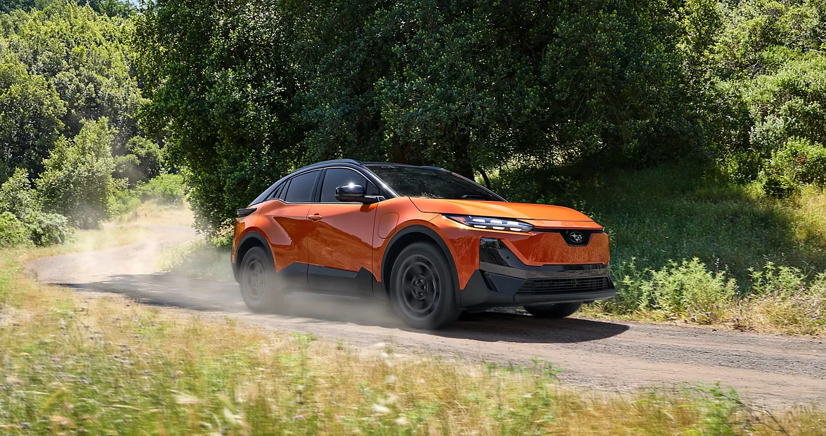 A 2026 Subaru Uncharted driving a mountain pass